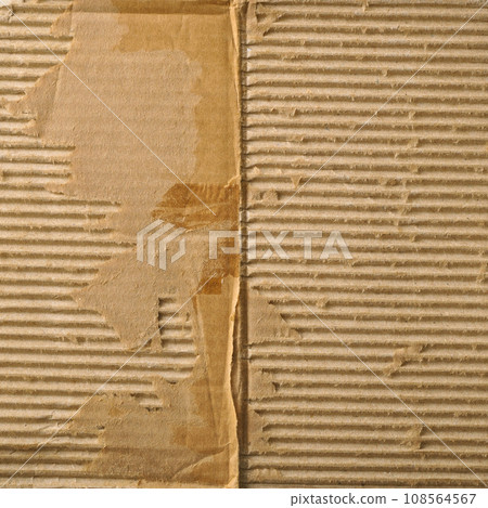 Brown and beige colored corrugated cardboard detail Brown and beige colored corrugated cardboard detail 108564567