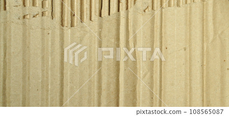Brown and beige colored corrugated cardboard detail Brown and beige colored corrugated cardboard detail 108565087