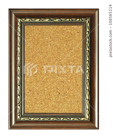 Wooden and gold gilded ornamental frame with rectangular cork board Wooden and gold gilded ornamental frame with rectangular cork board 108565114