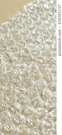 On corrugated cardboard paper plastic air bubble protection foil wrap texture background On corrugated cardboard paper plastic air bubble protection foil wrap texture background 108565157