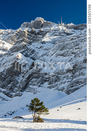 The majestic Saentis massif in winter, view from the Schwaegalp, Appenzell Ausserrhoden, Switzerland The majestic Saentis massif in winter, view from the Schwaegalp, Appenzell Ausserrhoden, Switzerland 108565506