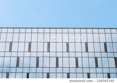 Skyscraper - view of the glass office building in the city. Skyscraper - view of the glass office building in the city. 108565540