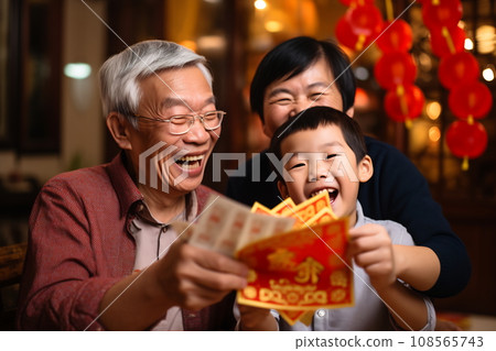 Multi generation family celebrating Chinese New Year Multi generation family celebrating Chinese New Year 108565743