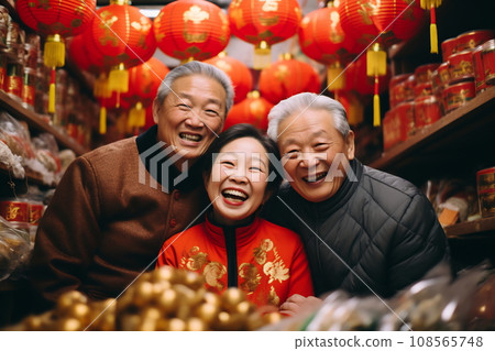 Multi generation family celebrating Chinese New Year Multi generation family celebrating Chinese New Year 108565748