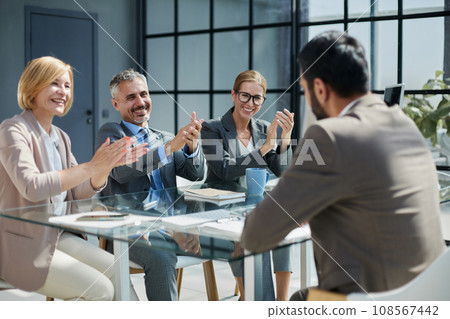 Multicultural professionals project managers group negotiating in boardroom at meeting. 108567442