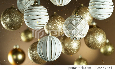 Christmas Holiday Balls with Falling Glittering Particles 108567831