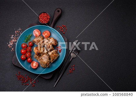 Delicious fried shish kebab of chicken or pork meat with salt, spices and herbs 108568840