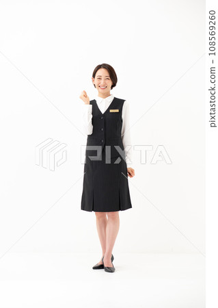 Woman in uniform business whole body vertical fist pump 108569260