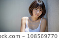 A woman looking at the camera 108569770
