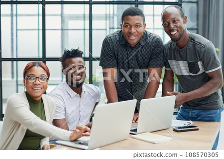 team of young designers at work in the office team of young designers at work in the office 108570305