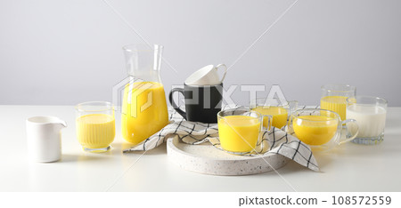 Moon or turmeric milk, concept of tasty drink Moon or turmeric milk, concept of tasty drink 108572559