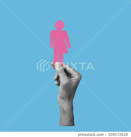 hand in black and white holding a gender neutral icon hand in black and white holding a gender neutral icon 108572626