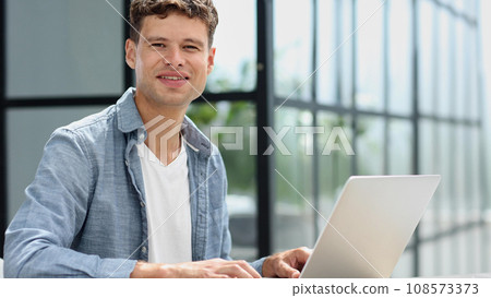 Businessman working on a laptop computer in the office 108573373