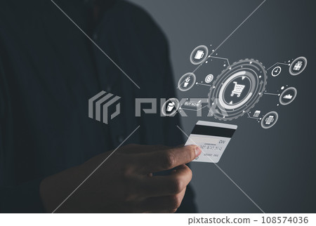 Businessman holding credit card for shopping online on mobile phone..E Commerce and Shopping online concept. 108574036