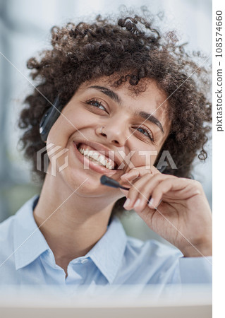 a girl in a modern office working in a call center concentrates on explaining the procedure a girl in a modern office working in a call center concentrates on explaining the procedure 108574660
