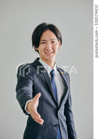 A male lawyer reaching out against a white background 108574832