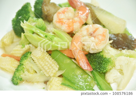 stir fried slice cauliflower and mixed vegetable with shrimp on plate 108576186