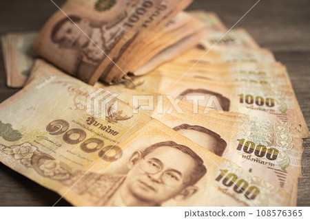 Thai baht banknotes, business saving finance investment concept. 108576365