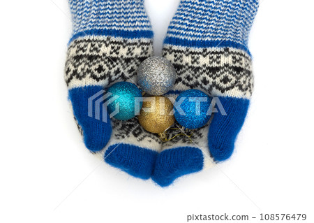 Christmas mittens are isolated on a white background 108576479