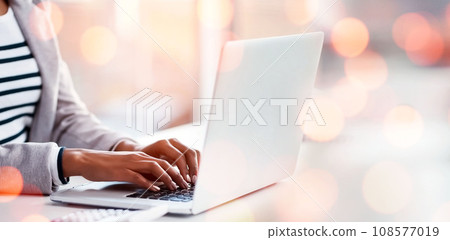 Laptop, bokeh and business woman doing research with document working on accounting budget project. Technology, notebook and closeup of professional female accountant typing on computer in workplace. Laptop, bokeh and business woman doing research with document working on accounting budget project. Technology, notebook and closeup of professional female accountant typing on computer in workplace. 108577019