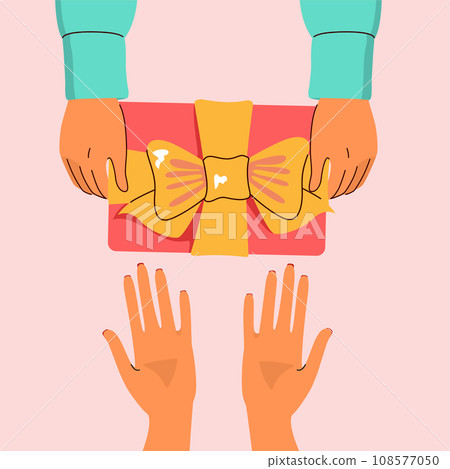Male Hands Giving Christmas Gift To Female Hands Male Hands Giving Christmas Gift To Female Hands 108577050