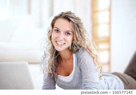 Laptop, smile and portrait of woman on floor in home, typing email and network on internet. Computer, happy face and girl in living room on social media, website and communication on tech to relax Laptop, smile and portrait of woman on floor in home, typing email and network on internet. Computer, happy face and girl in living room on social media, website and communication on tech to relax 108577145