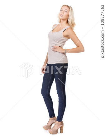 Portrait, woman and fashion for clothes in studio for white background for mock up in Russia. Face, female model or serious expression for relaxed, calm and pose for cool, hip or trendy style 108577362