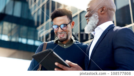 Tablet, discussion and business men in the city planning a legal strategy in collaboration. Meeting, digital technology and team of professional male lawyers working on corporate case in urban town. Tablet, discussion and business men in the city planning a legal strategy in collaboration. Meeting, digital technology and team of professional male lawyers working on corporate case in urban town. 108577808