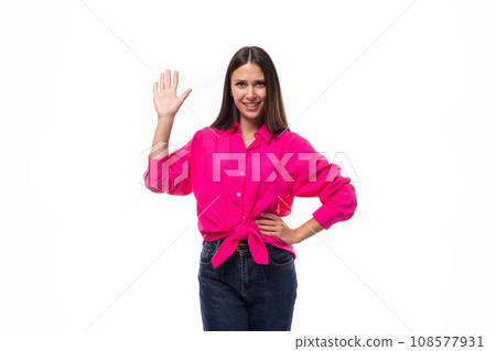 young confident caucasian brunette woman wears bright crimson shirt 108577931