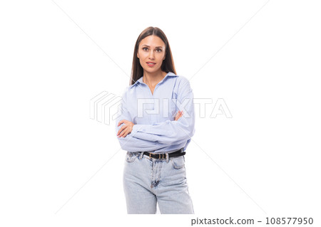 young pretty european brunette business woman with light makeup in a light blue blouse on a white young pretty european brunette business woman with light makeup in a light blue blouse on a white 108577950