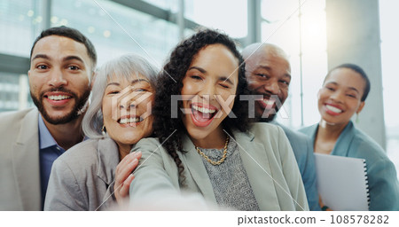Happy business people, face and office selfie for photography, team building or social media. Group of diverse corporate employees smile together for teamwork, photograph or fun picture at workplace Happy business people, face and office selfie for photography, team building or social media. Group of diverse corporate employees smile together for teamwork, photograph or fun picture at workplace 108578282