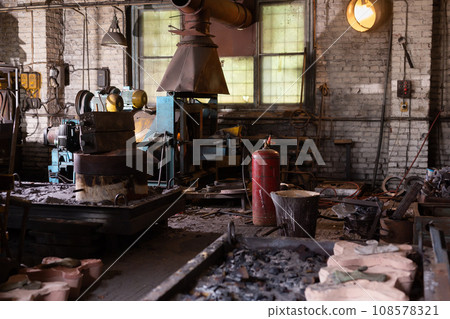 Ferrous metal billet is melted in an induction furnace closeup 108578321