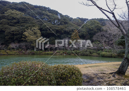 Umi Jigoku blue water hot spring. One of the eight hot springs is landmark in touris location at Beppu, Oita, Japan. Umi Jigoku blue water hot spring. One of the eight hot springs is landmark in touris location at Beppu, Oita, Japan. 108578461
