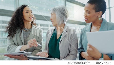 Business woman, meeting and documents in team discussion, brainstorming or collaboration at office. Female person or group of employees with paperwork in financial planning or strategy at workplace 108578578