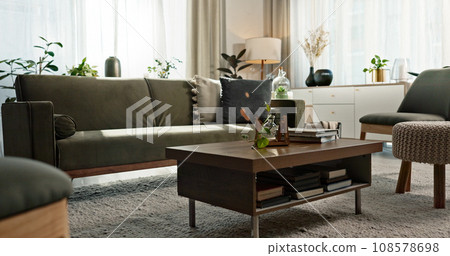 Home interior, furniture and background of living room with sofa, couch and coffee table. Lounge design in modern house, apartment and space in new property, residential real estate and accommodation Home interior, furniture and background of living room with sofa, couch and coffee table. Lounge design in modern house, apartment and space in new property, residential real estate and accommodation 108578698