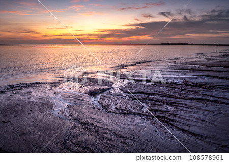 Nai Yang Beach during sunset in Phuket, Thailand Nai Yang Beach during sunset in Phuket, Thailand 108578961