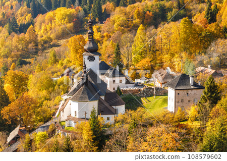 Church in The Spania Dolina village at autumn season, Slovakia. 108579602