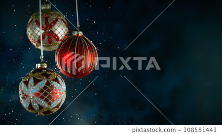 Decorative Christmas Balls with Bokeh Lights and Glitters Falling Decorative Christmas Balls with Bokeh Lights and Glitters Falling 108581441