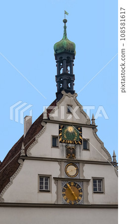 The fragment or detail of historical building at Rothenburg ob der Tauber where is the fortified city at Germany. 108581617