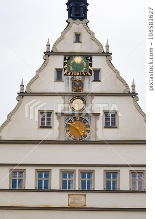 The fragment or detail of historical building at Rothenburg ob der Tauber where is the fortified city at Germany. The fragment or detail of historical building at Rothenburg ob der Tauber where is the fortified city at Germany. 108581627