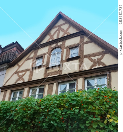 The fragment or detail of historical building at Rothenburg ob der Tauber where is the fortified city at Germany. 108581725