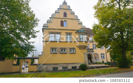 The fragment or detail of historical building at Rothenburg ob der Tauber where is the fortified city at Germany. The fragment or detail of historical building at Rothenburg ob der Tauber where is the fortified city at Germany. 108583112