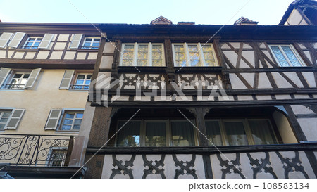 Historic wooden facade in downtown of Strasbourg, France, Historic wooden facade in downtown of Strasbourg, France, 108583134