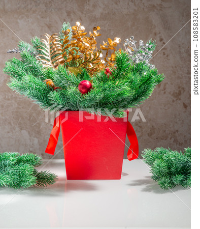 Layout of New Year's toys, accessories, gifts on a light wooden background. New Year background. Layout of New Year's toys, accessories, gifts on a light wooden background. New Year background. 108583201
