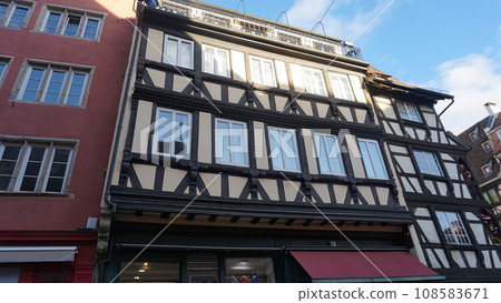 Historic wooden facade in downtown of Strasbourg, France, Historic wooden facade in downtown of Strasbourg, France, 108583671