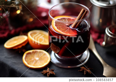 Hot mulled wine with fruits and spices. Traditional hot drink at Christmas time. Generative AI Hot mulled wine with fruits and spices. Traditional hot drink at Christmas time. Generative AI 108583857