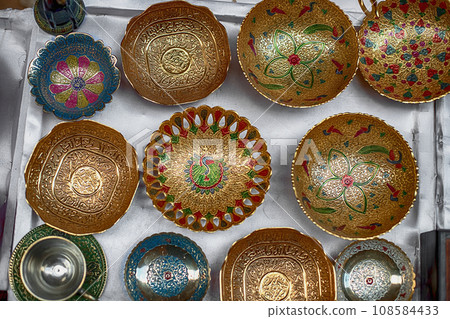 Close-up of souvenirs at an open-air store located along the Siq Canyon in Petra, Jordan Close-up of souvenirs at an open-air store located along the Siq Canyon in Petra, Jordan 108584433