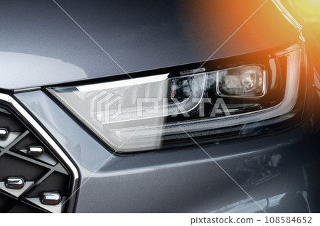 Modern car led headlight close up view 108584652