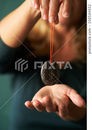 stone runic talisman for good luck in your hand stone runic talisman for good luck in your hand 108584932