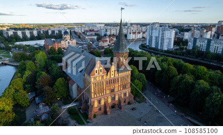 Kaliningrad city aerial shot. Immanuel Kant Cathedral and Museum, drone view. Immanuel Kant Island. Konigsberg at sunset Kaliningrad city aerial shot. Immanuel Kant Cathedral and Museum, drone view. Immanuel Kant Island. Konigsberg at sunset 108585100